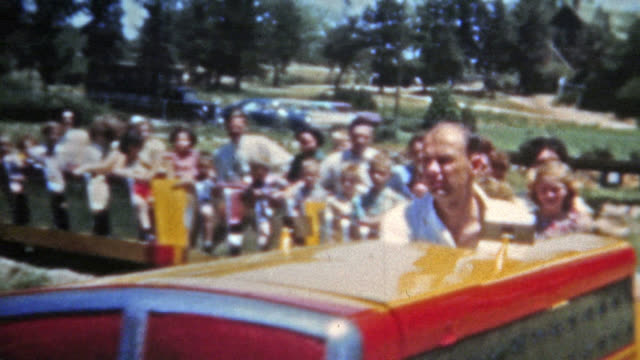DENVER, COLORADO 1951: Family riding Elitch Gardens classic train ride