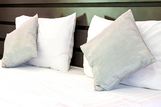 istock pillows on a bed Comfortable soft pillows on the bed 490042228