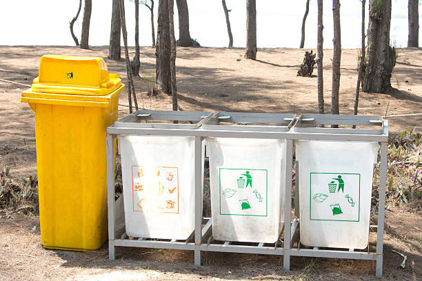 istock recycle bins at public park 490042324