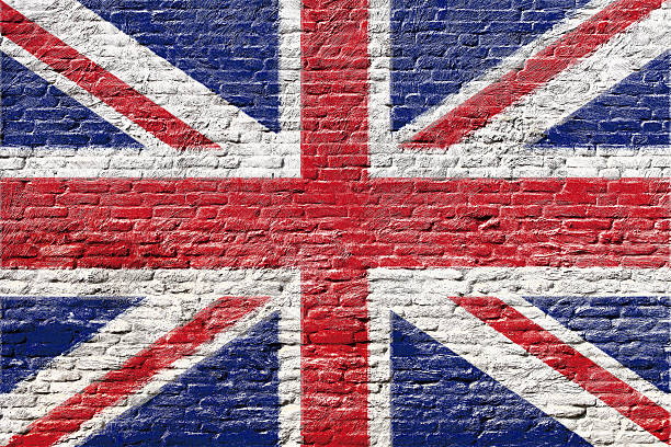 royaume-uni-drapeau sur mur de briques - british flag flag old fashioned retro revival photos et images de collection