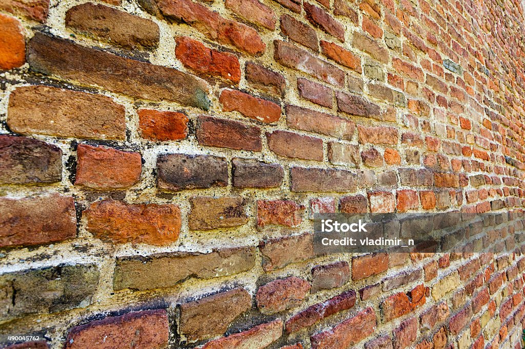 orange old brick wall orange old brick wall at belgrade fortress, belgrade serbia 2015 Stock Photo