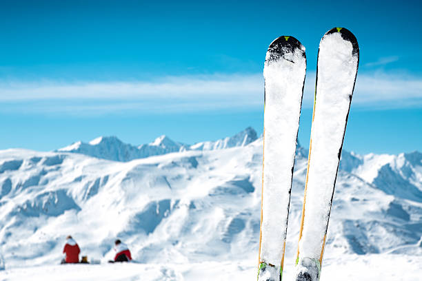 istock Skis On Top Of Ski Slope 490045872