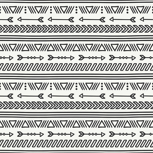 Hand drawn geometric ethnic seamless pattern. Doodles style.Tribal native vector. Hand drawn geometric ethnic seamless pattern. Wrapping paper. Scrapbook paper. Doodles style. Tiling. Tribal native vector illustration. Aztec background. Stylish ink graphic texture. famous archer stock illustrations