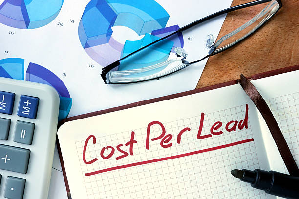 Notepad with Cost per lead CPL  on office wooden table.