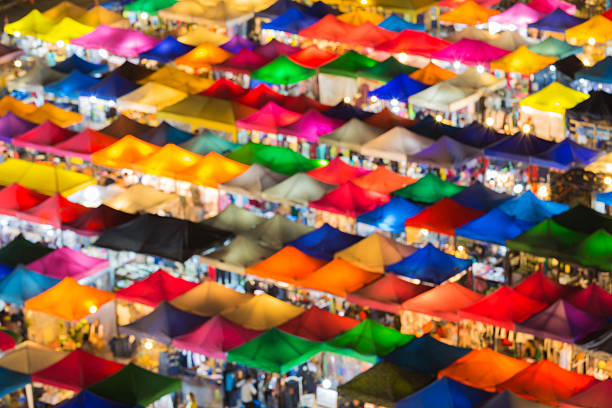 istock Abstract blurred bokeh multiple light of flea market top view 490050502