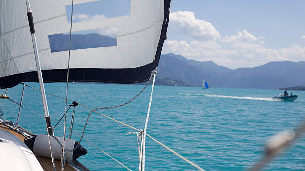 Sailing at lake Attersee Lake Attersee seen from a sailing boat attersee stock pictures, royalty-free photos & images