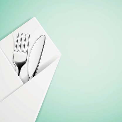 Fork and knife in a napkin.