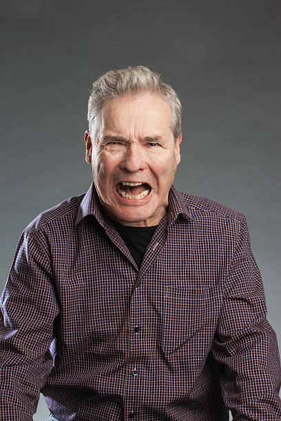 istock Shouting - senior portrait series on grey background. 490054496