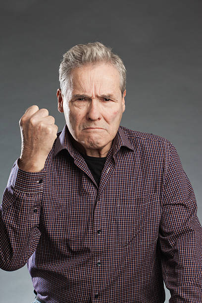 istock Angry - senior portrait series on grey background. 490054538