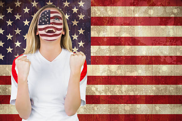 istock Excited fan in usa face paint cheering 490063339