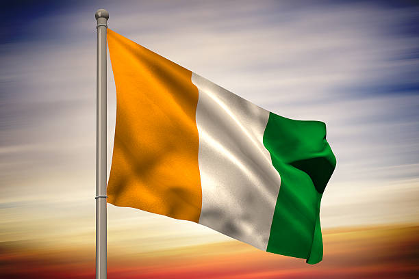istock Ivory coast national flag on flagpole 490063453