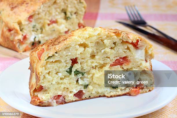 Savory Cake With Tomato Feta Cheese And Arugula Stock Photo - Download Image Now - Feta Cheese, Cake, Spinach