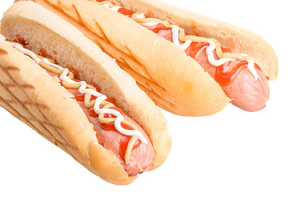 Hot dogs with mustard and ketchup stock photo