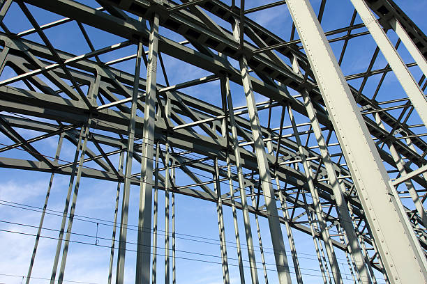 istock Construction of a railway bridge against sky in sunlight 490068265