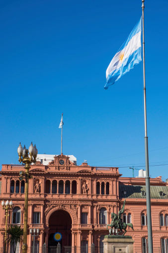 The Casa Rosada and an argentinean flag in Buenos Aires