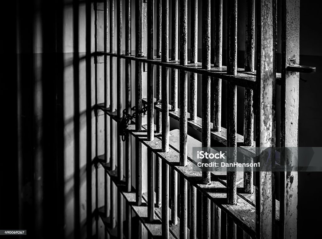 Prison Cell Bars Prison Cell Bars - Black and White Prison Stock Photo