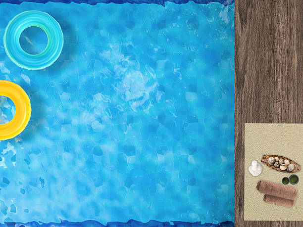 istock pool top view with swim rings and beach ball 490069934