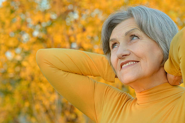 istock Senior woman walking 490070522