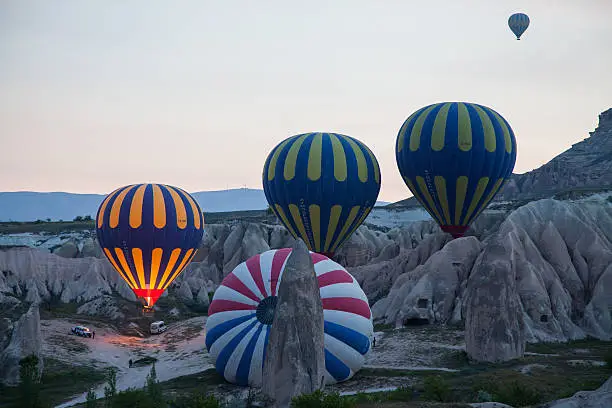 Photo of hot air balloon ready for take off from ground