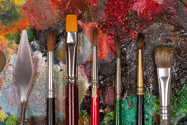 istock palette with set of brushes and palette knife 490073572