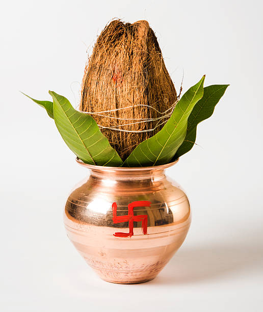 istock copper kalash/pot & coconut and mango leaf hindu puja item 490077090