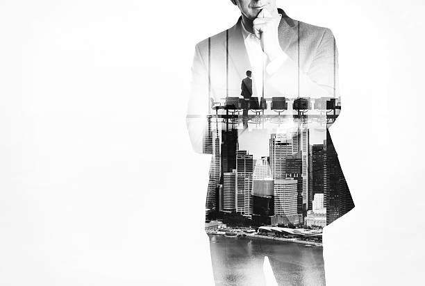 istock Double exposure concept with young business man 490078126
