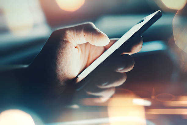 istock Closeup of hand using smartphone with effects 490079348