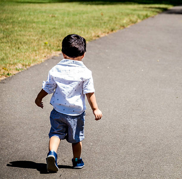 istock Latino child walking alone outside 490080212