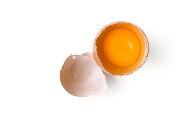 egg yolk egg yolk on white background egg yolk on white stock pictures, royalty-free photos & images