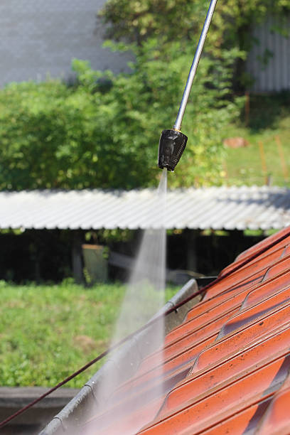 istock Roof cleaning with high pressure 490080320