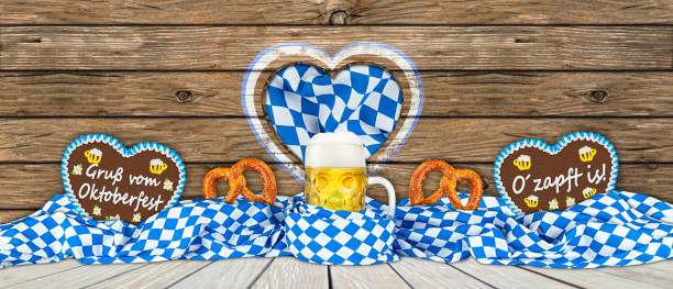 bavarian flag pretzel gingerbread hearts and beer german Beer Fest beer mug gingerbread hearts and pretzel in bavarian flag large german beer steins stock pictures, royalty-free photos & images