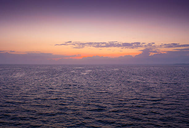 istock Wonderful sunset over the ocean, where sailing boat 490082672
