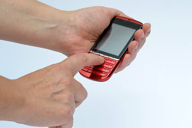 istock feminine hands and smart phone 490083420
