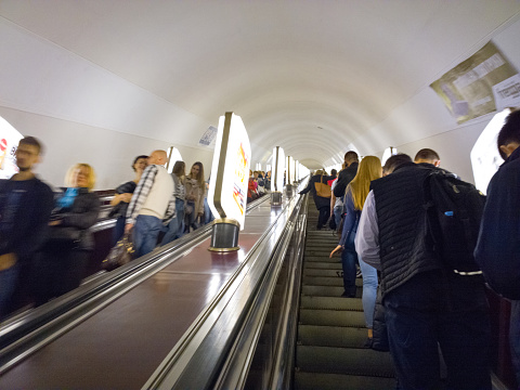 Kyiv, Ukraine - September 16, 2015: People on the escalator in the Metro in Kyiv, Ukraine. 