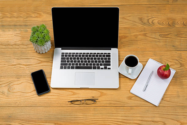 istock Traditional wooden desktop with modern technology for mobile wor 490085164