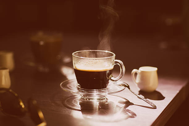 istock cup of hot coffee on the table 490100710