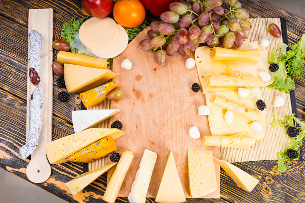 istock Large variety of cheeses displayed around a board 490102206