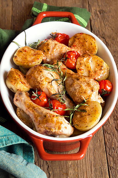 istock Oven baked chicken and vegetables 490102822