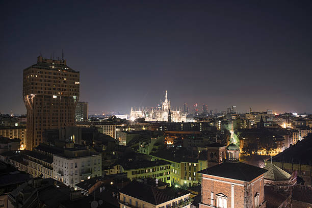 Milan, 2015 panoramic skyline by night Milan, 2015 panoramic skyline by night galleria vittorio emanuele ii stock pictures, royalty-free photos & images
