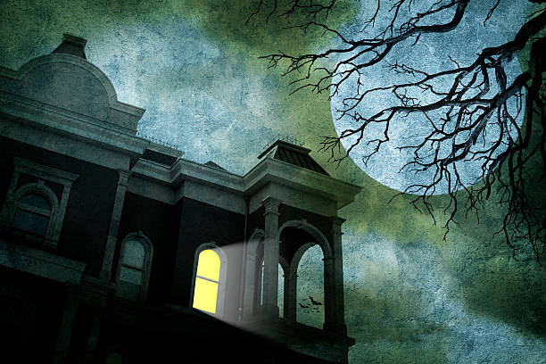 istock Haunted House In Front Of Full Moon 490110290
