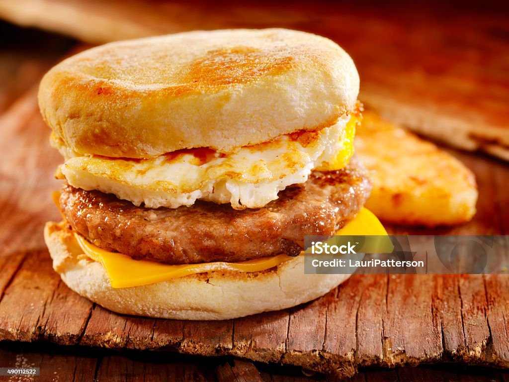 Sausage and Egg Breakfast Sandwich Sausage and Egg Breakfast Sandwich with a Hash brown Patty - Photographed on a Hasselblad H3D11-39 megapixel Camera System Breakfast Stock Photo