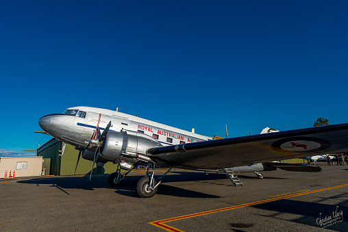 Parkes, Central West, NSW, Australia- September 25, 2015: DC 3 in front of hangar while visiting Parkes. DC3 restored and operated by Historic Aircraft Restoration Association (HARS).