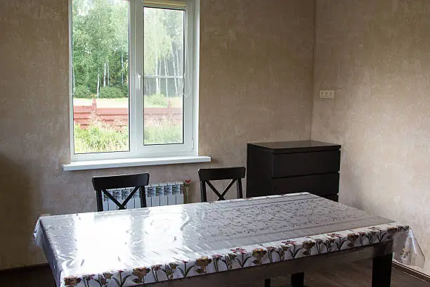 dining table and two chairs in a country house