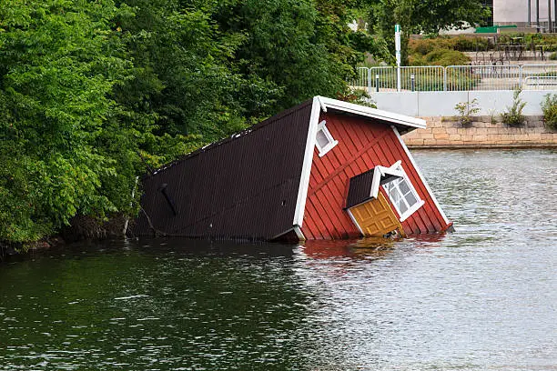 A sunken house in a river of MalmÃ¶, Sweden