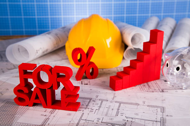istock Hard hat with blueprints and rulers 490129112