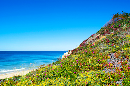 The Algarve, Portugal. A beach in the Algarve district of Portugal. 