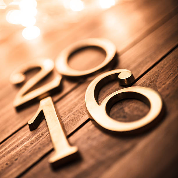 istock golden 2016 New year text on plank wood 490129462