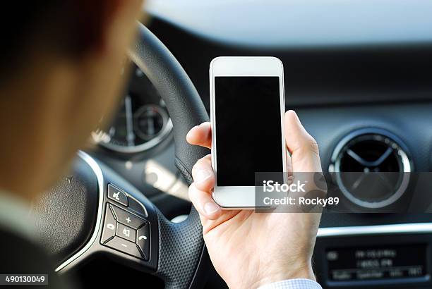 Businessman Texting While Driving A Car Stock Photo - Download Image Now - Adult, Adults Only, Business