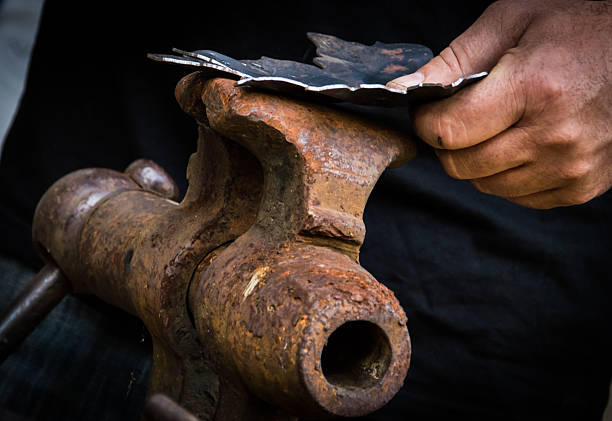 istock The smith and the leaf of steel 490130330