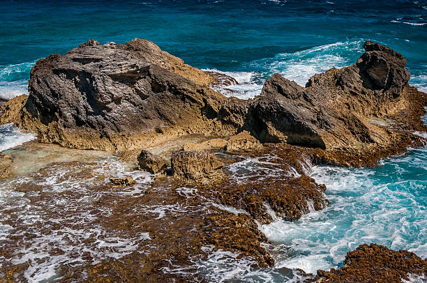 Rocky formation on the Caribbean shore in Mexico stock photo
